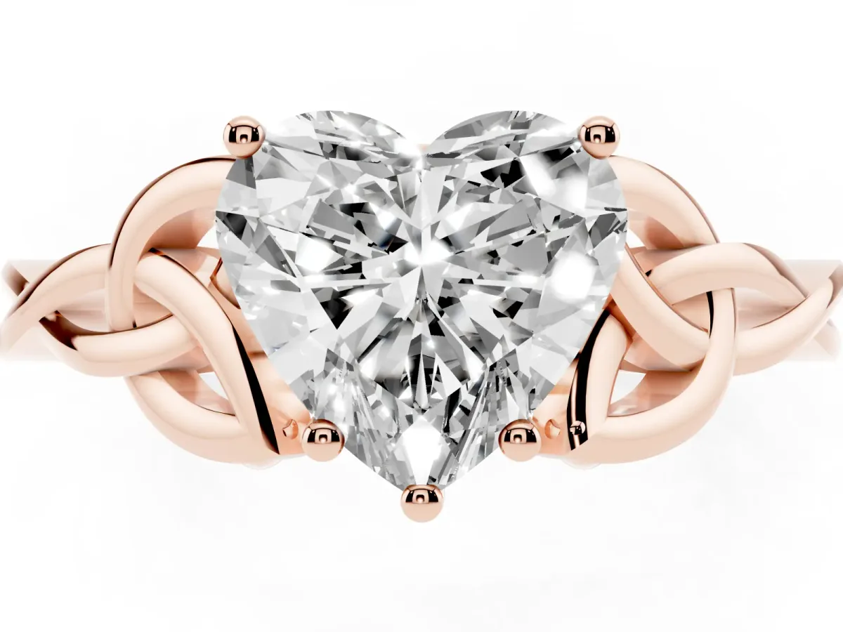 Heart Cut Diamond Solitaire Engagement Ring with Celtic Knot Band and Four-Prong Setting Rose gold