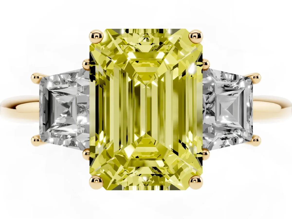 Fancy Yellow Emerald Cut Diamond Three-Stone Ring with Trapezoid Side Stones and Prong Setting Yellow gold