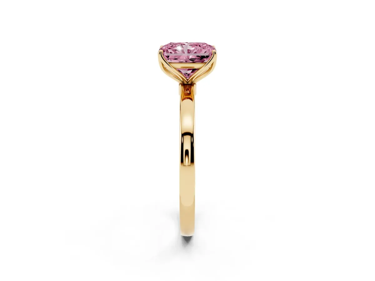 Fancy Pink Radiant Cut Diamond Solitaire Ring with Thin Band and Prong Setting Yellow gold