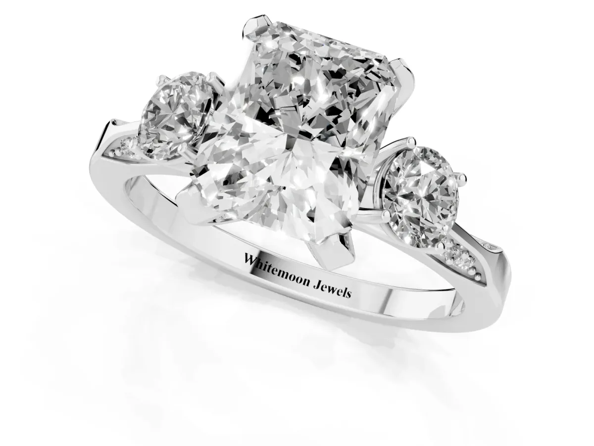 Radiant Cut Brilliant Three-Stone Diamond Ring with Pavé Band and Four-Prong Setting White gold