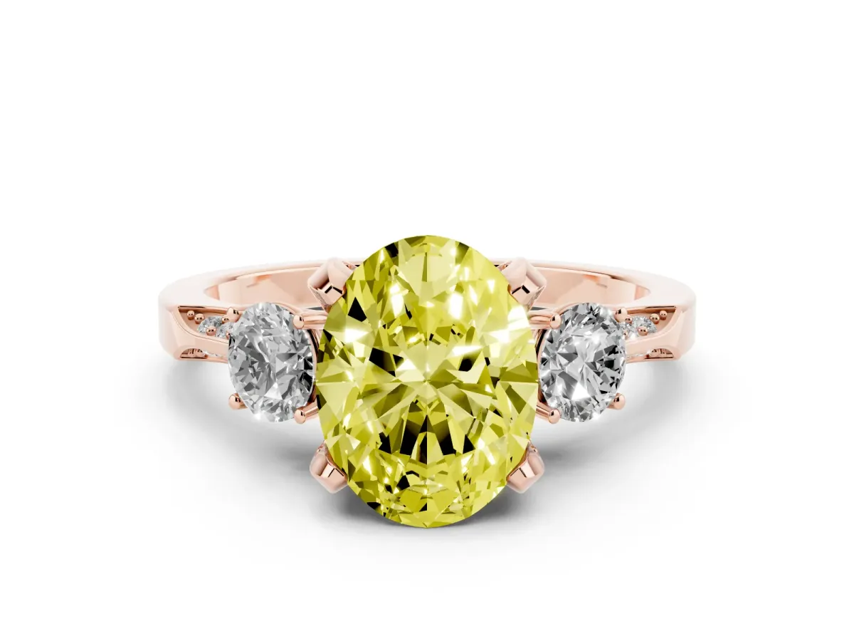 Fancy Yellow Oval Cut Brilliant Three-Stone Diamond Ring with Pavé Band and Four-Prong Setting Rose gold