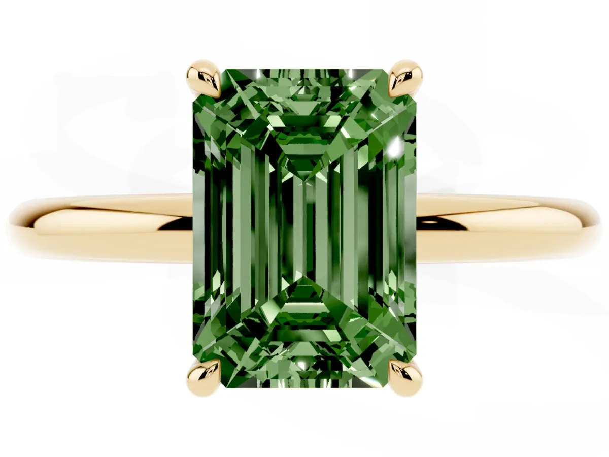 Fancy Green Emerald Cut Diamond Solitaire Ring with Thin Band and Four-Prong Setting Yellow gold