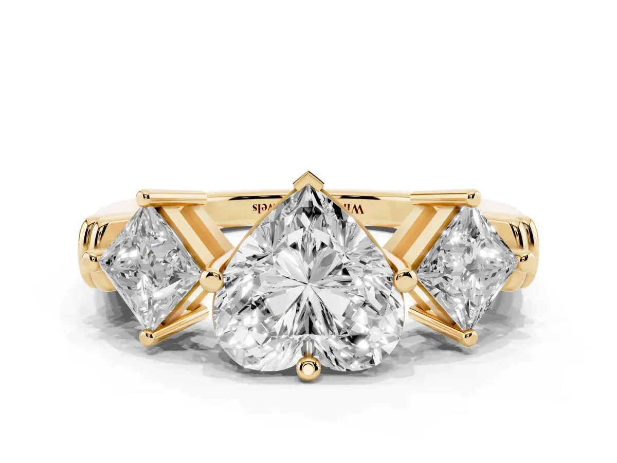 Three-Stone Heart Cut and Princess Cut Diamond Ring with Channel Band and Four-Prong Setting Yellow gold