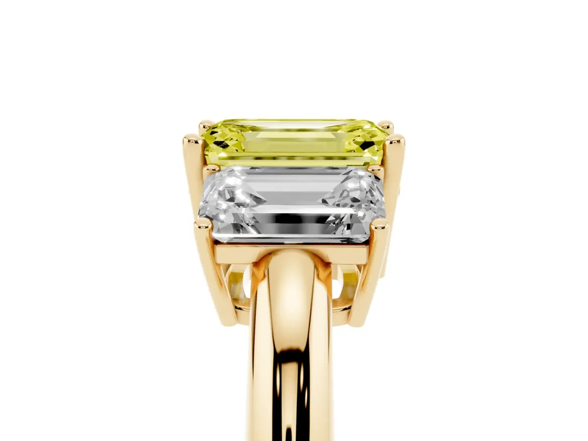 Fancy Yellow Three-Stone Emerald Cut Cut Diamond Engagement Ring with Prong Setting on a White Gold Band Yellow gold