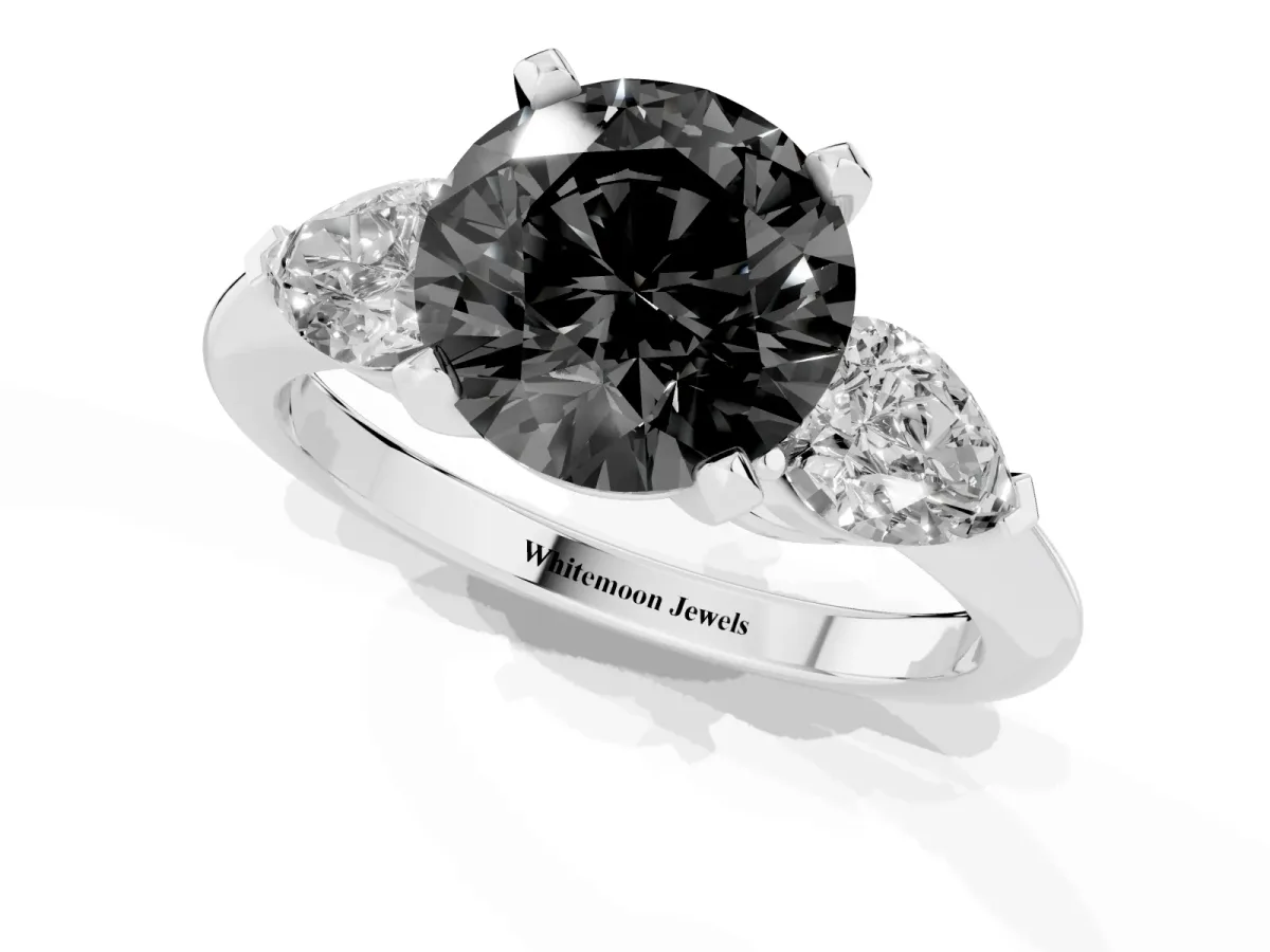 Fancy Black Three-Stone Round Cut Diamond Ring with Pear Side Stones and Four-Prong Setting Silver