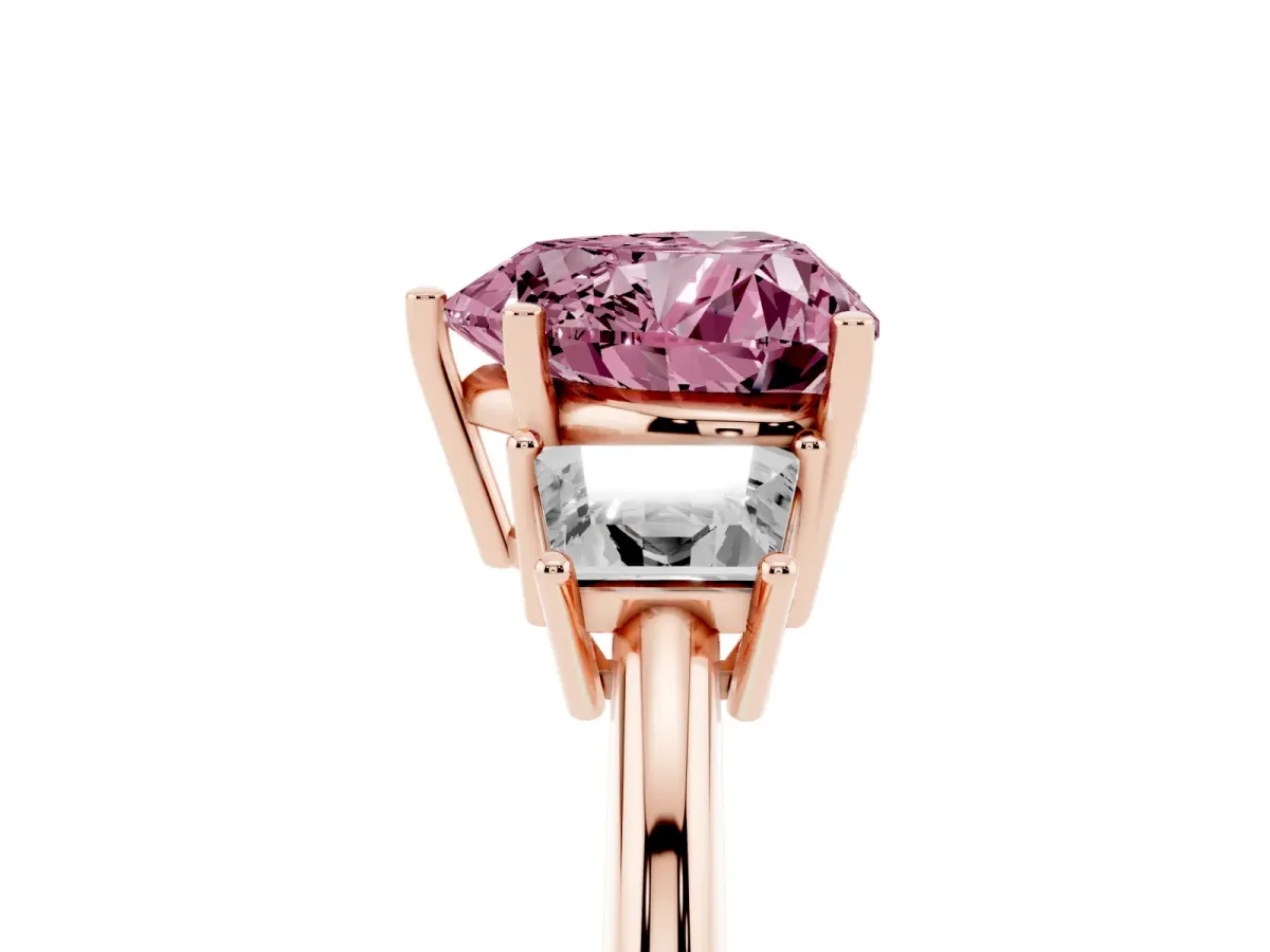 Fancy Pink Heart Cut Diamond Three-Stone Ring with Trapezoid Side Stones and Prong Setting Rose gold