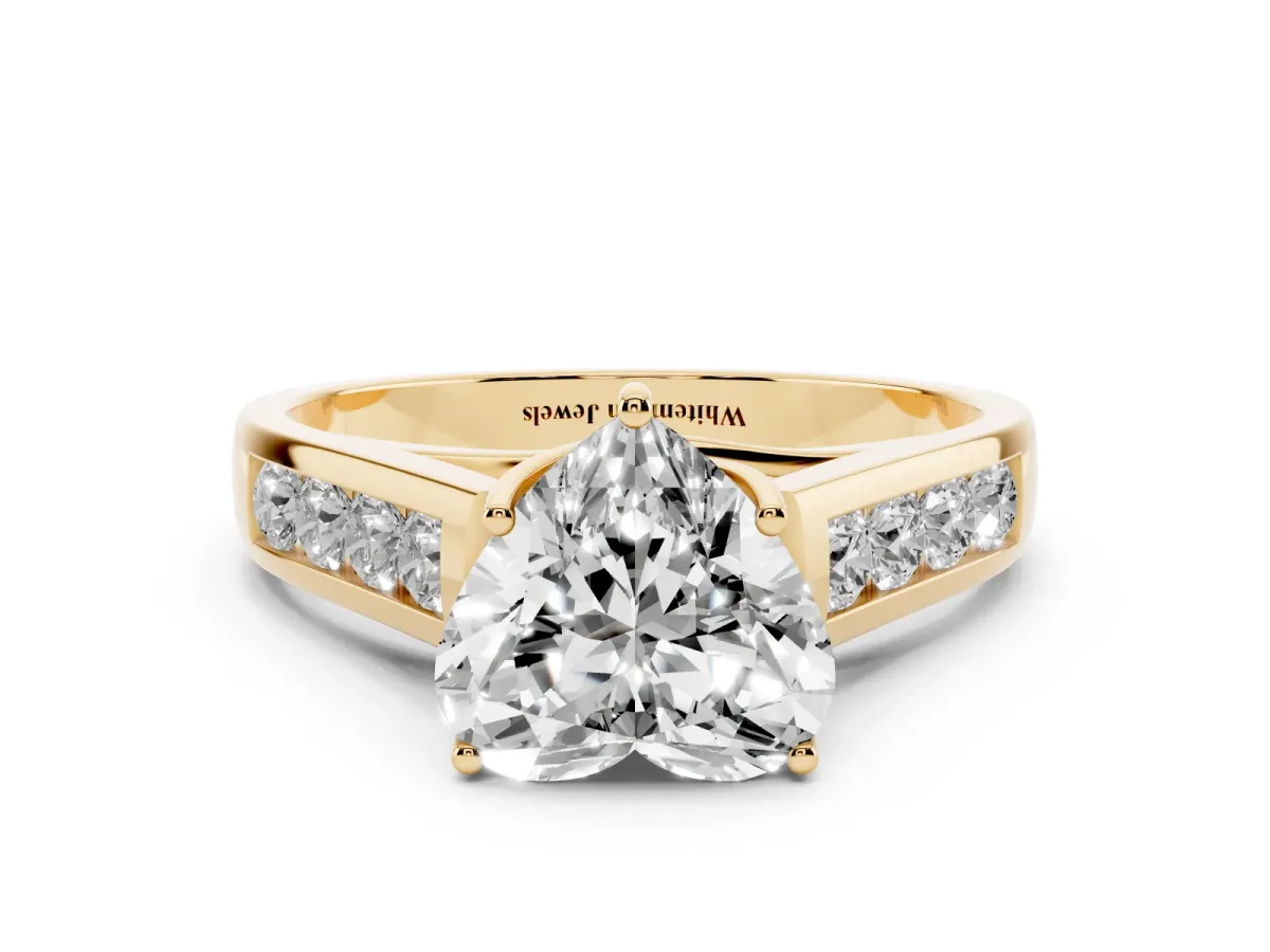 Heart Cut Brilliant Channel-Set Solitaire Ring with Four-Prong Setting Yellow gold