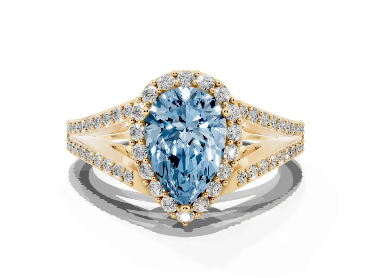 Fancy Blue Pear Cut Halo Split Shank Pave Diamond Ring with Four-Prong Setting Yellow gold