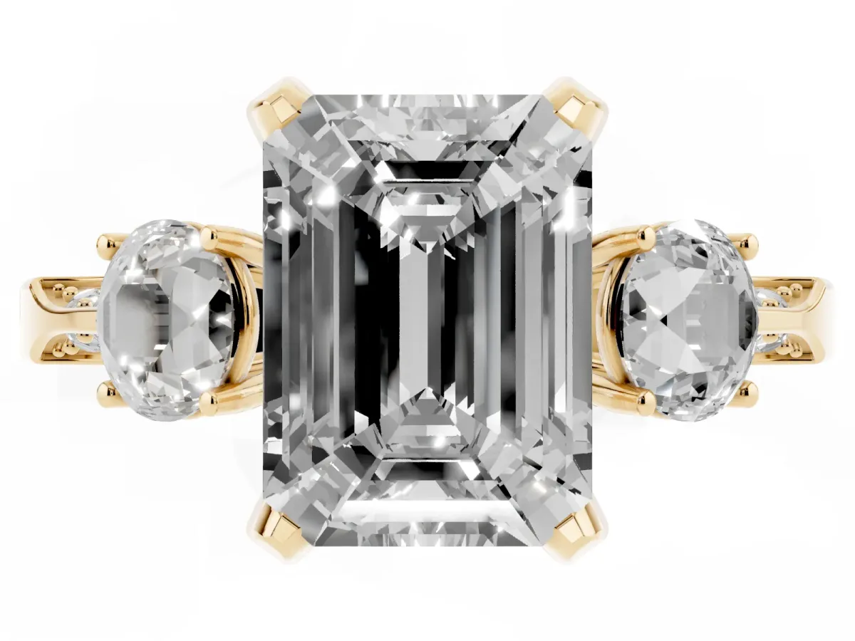 Fancy Black Emerald Cut Brilliant Three-Stone Diamond Ring with Pavé Band and Four-Prong Setting Yellow gold