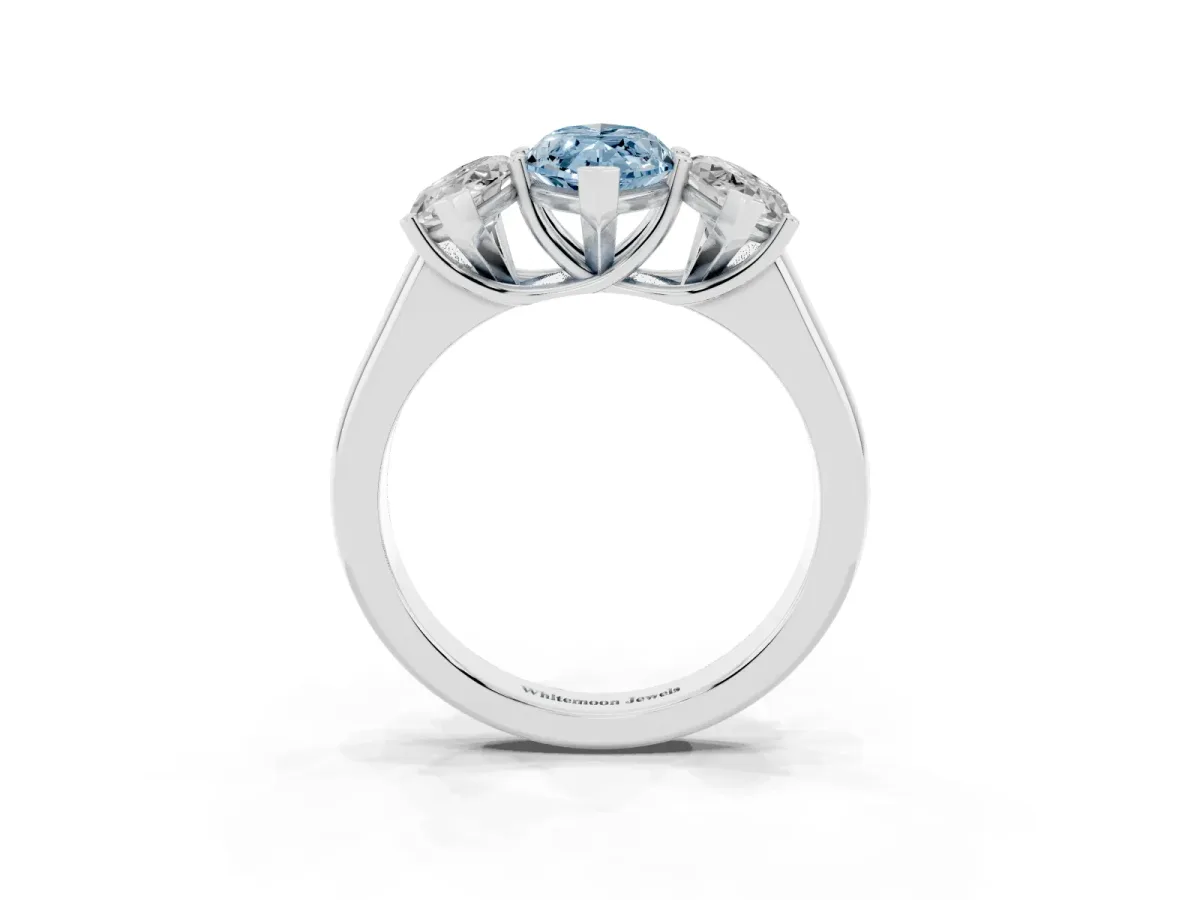 Fancy Blue Marquise Cut Three-Stone Diamond Ring with Prong Setting on a Classic Band Silver