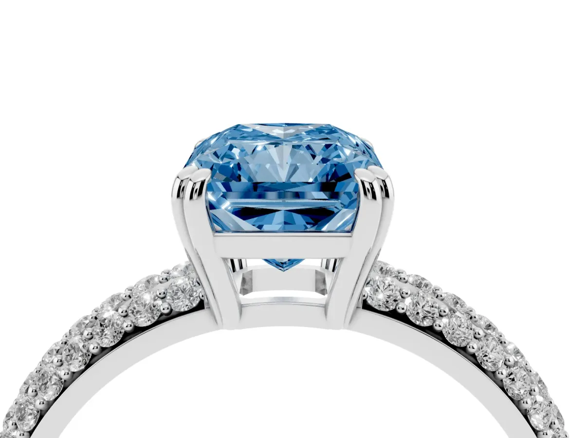 Fancy Blue Radiant Cut Diamond Solitaire Ring with Multi-Row Round Pavé Band and Prong Setting Silver