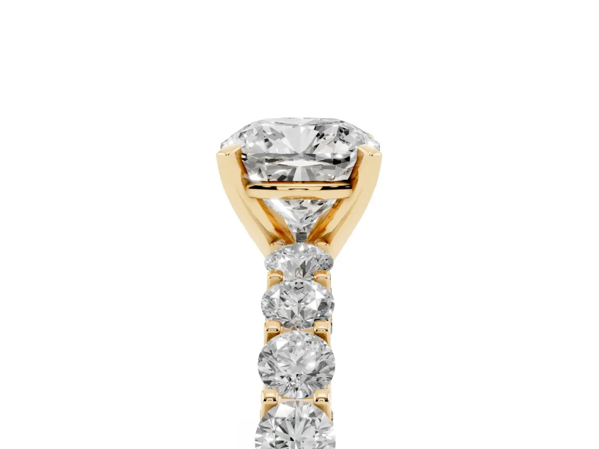Cushion Cut Diamond Solitaire Ring with Shared Prong Pavé Band and Four-Prong Setting Yellow gold