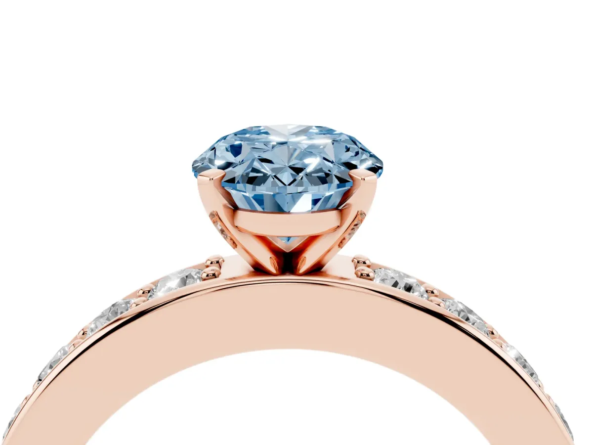 Fancy Blue Oval Cut Diamond Engagement Ring with Channel Set Round Band and Prong Setting Rose gold