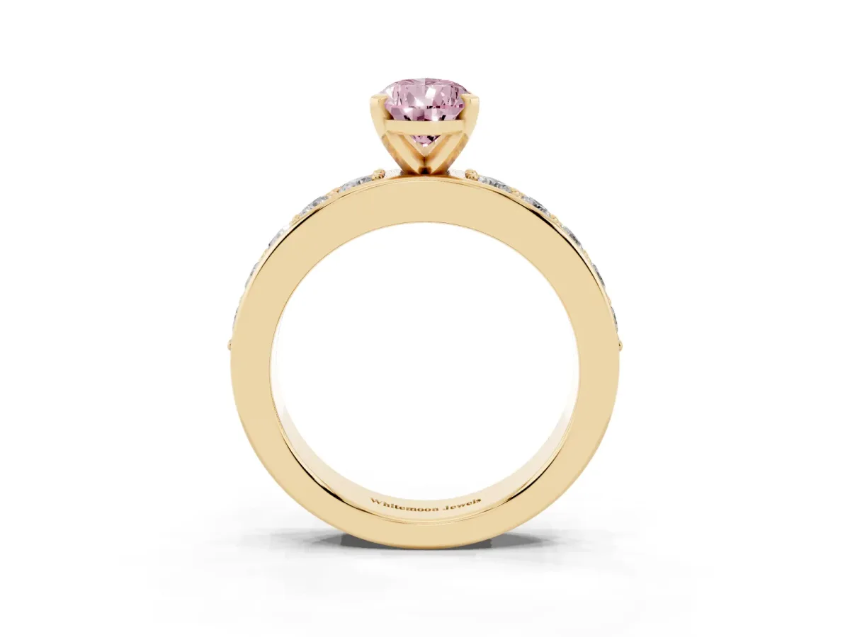 Fancy Pink Pear Cut Diamond Engagement Ring with Channel Set Round Band and Prong Setting Yellow gold
