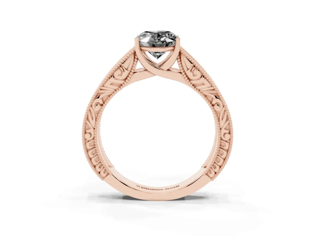 Fancy Black Oval Cut Diamond Solitaire Ring with Engraved Band and Four-Prong Setting Rose gold