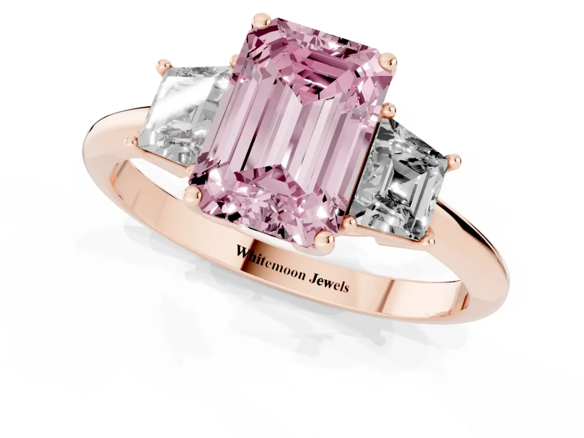 Fancy Pink Emerald Cut Diamond Three-Stone Ring with Trapezoid Side Stones and Prong Setting Rose gold