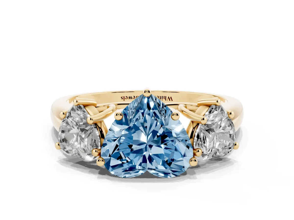 Fancy Blue Three-Stone Heart Cut Diamond Engagement Ring with Prong Setting Yellow gold