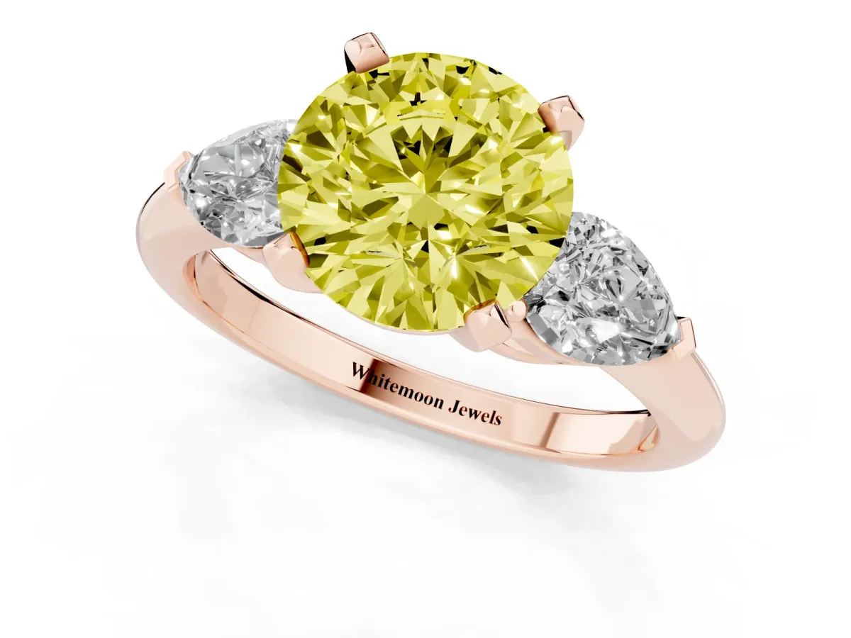 Fancy Yellow Three-Stone Round Cut Diamond Ring with Pear Side Stones and Four-Prong Setting Rose gold