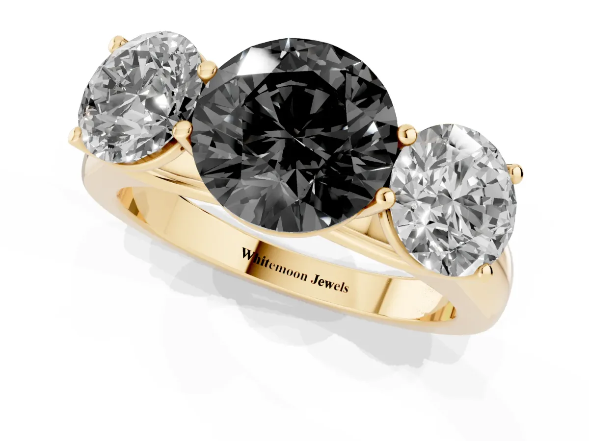 Fancy Black Round Cut Three-Stone Diamond Ring with Prong Setting on a Classic Band Yellow gold