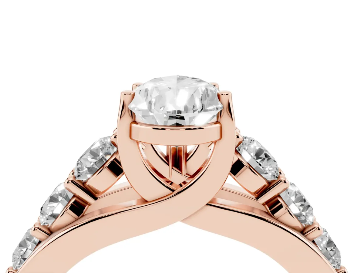 Pear Cut Diamond Engagement Ring with Pavé Band and Four-Prong Setting Rose gold