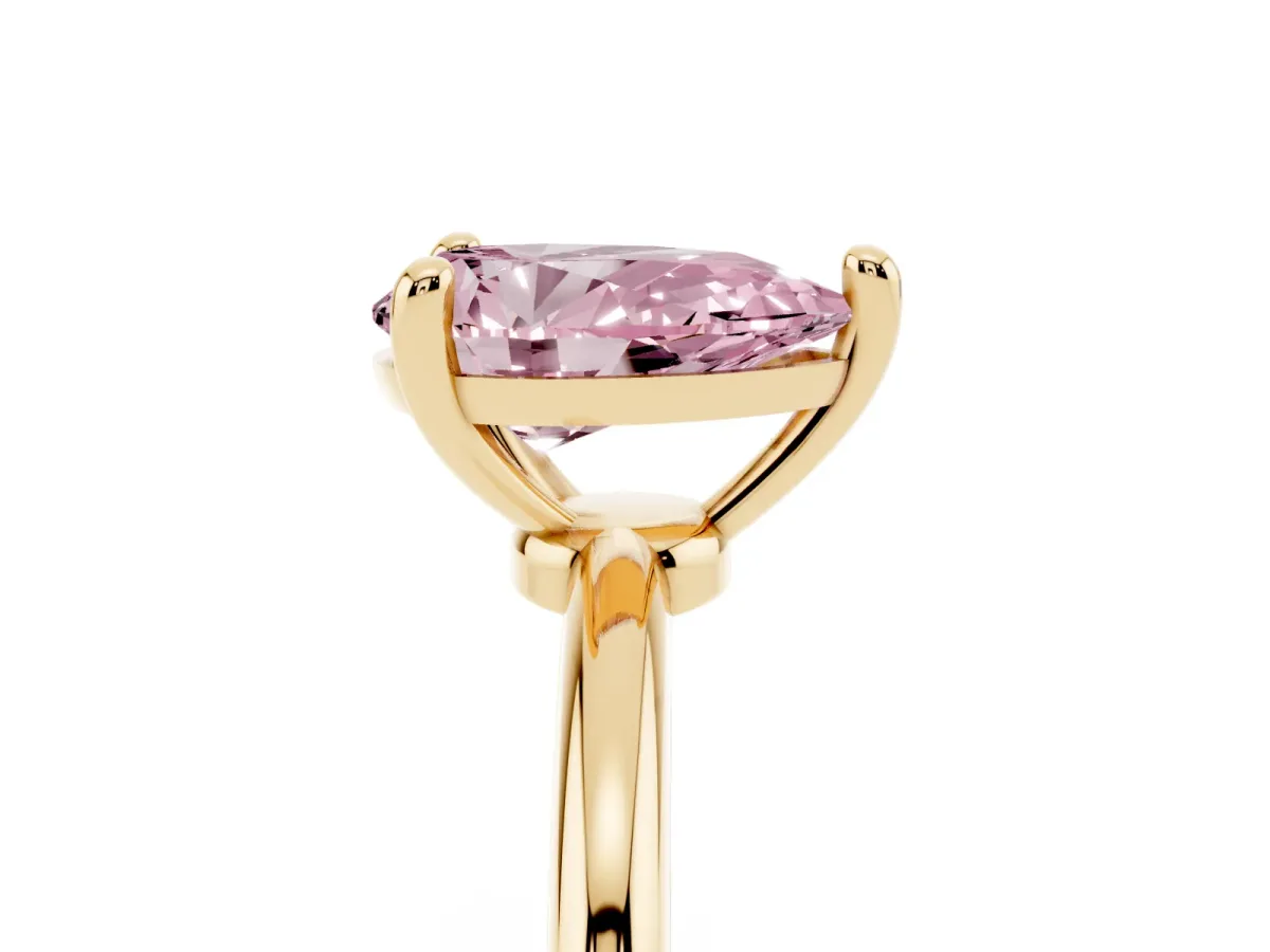 Fancy Pink Pear Cut Solitaire Diamond Ring with 4-Prong Setting on a Classic Band Yellow gold