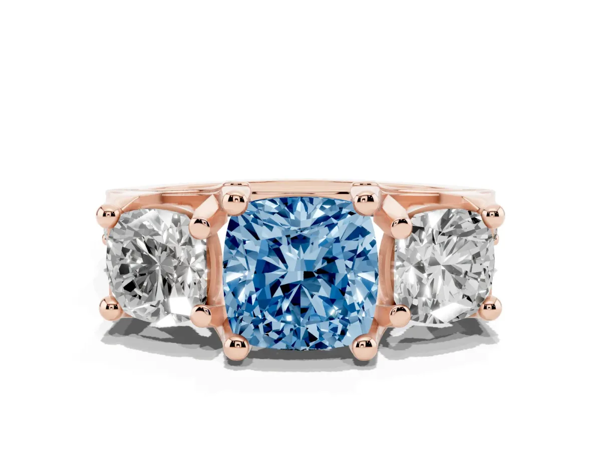 Fancy Blue Cushion Cut Diamond Three-Stone Ring with Channel Set Band and Four-Prong Setting Rose gold