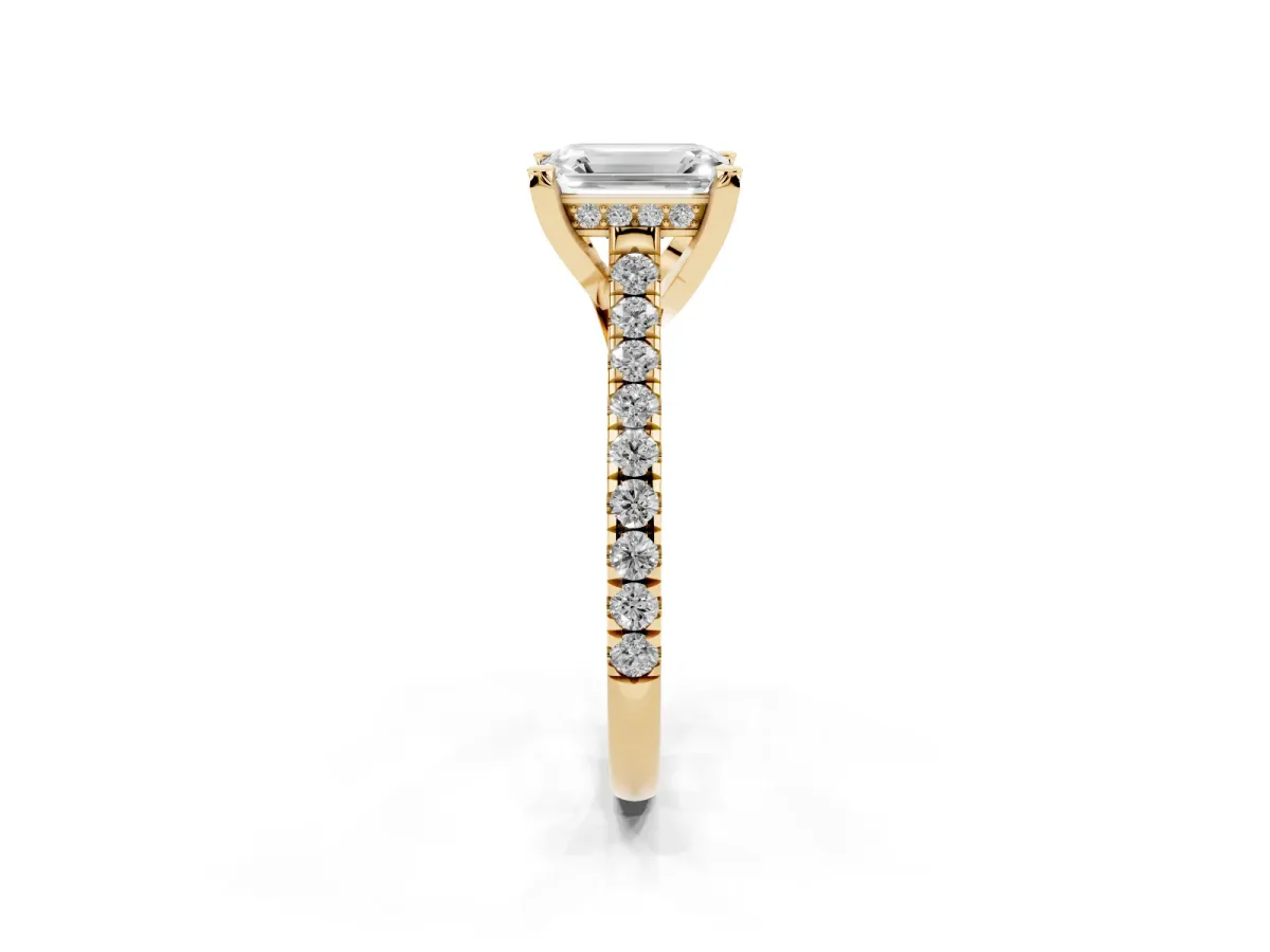 Emerald Cut Brilliant Diamond Solitaire with Pavé Band and Four-Prong Setting Yellow gold