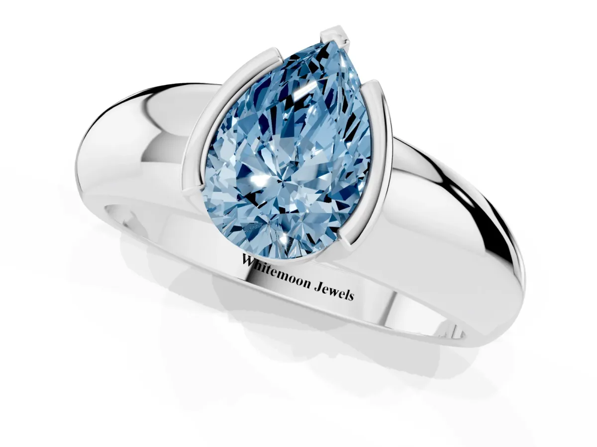 Fancy Blue Pear Cut Solitaire Tension Set Diamond Ring with Wide Band Silver