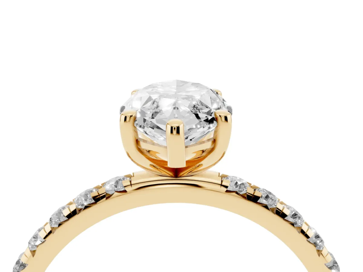 Marquise Cut Cut Diamond Solitaire Ring with Micro Pave Band and Four Prong Setting Yellow gold