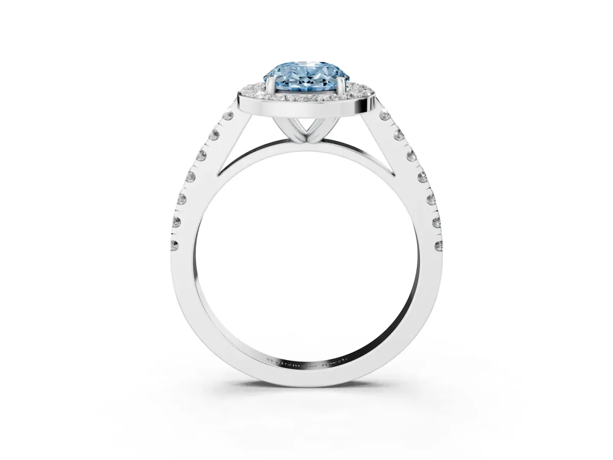 Fancy Blue Oval Cut Diamond Halo Ring with Round Pavé Split Shank and Prong Setting Platinum