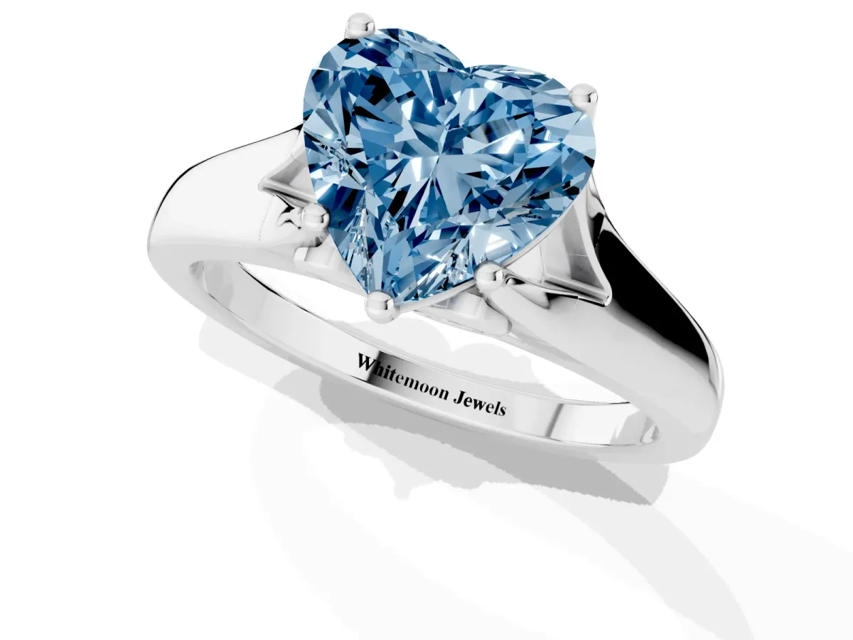 Fancy Blue Heart Cut Solitaire Diamond Ring with Cathedral Band and Four-Prong Setting Silver
