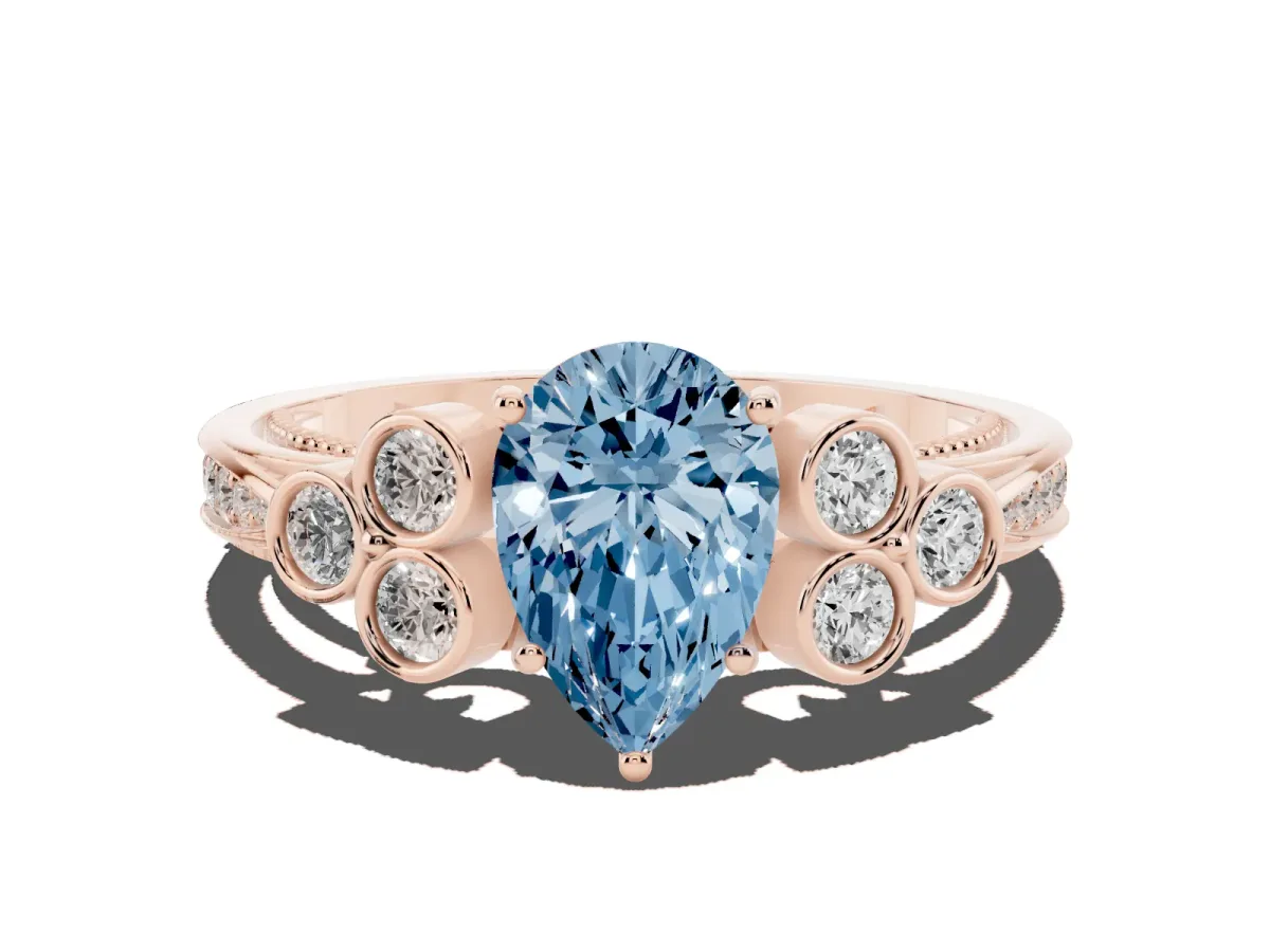 Fancy Blue Pear Cut Cut Diamond Engagement Ring with Bezel Set Round Side Stones and Prong Setting Rose gold
