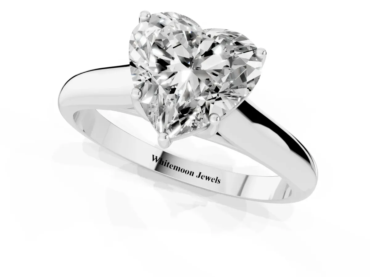 Heart Cut Cut Diamond Solitaire Engagement Ring with Tapered Plain Band and Four-Prong Setting Platinum