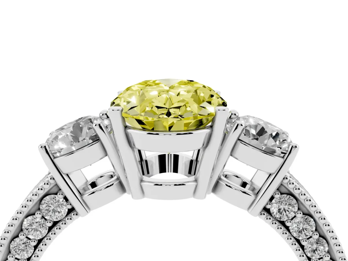 Fancy Yellow Oval Cut Three-Stone Diamond Ring with Pavé Band and Four-Prong Setting Silver