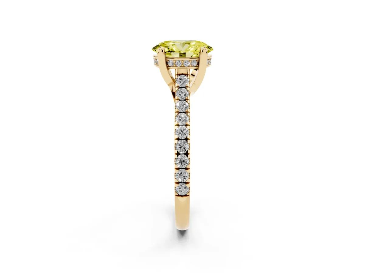 Fancy Yellow Oval Cut Brilliant Diamond Solitaire with Pavé Band and Four-Prong Setting Yellow gold