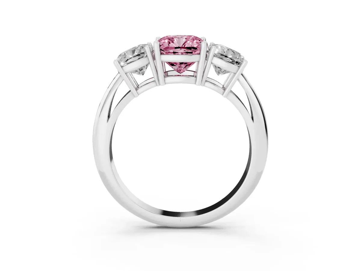 Fancy Pink Three-Stone Cushion Cut Cut Diamond Engagement Ring with Prong Setting on a White Gold Band Platinum
