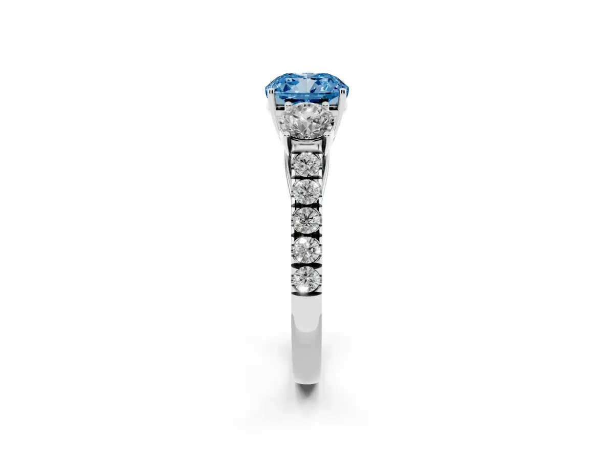 Fancy Blue Cushion Cut Cut Diamond Three-Stone Ring with Round Side Stones and Pavé Band Silver