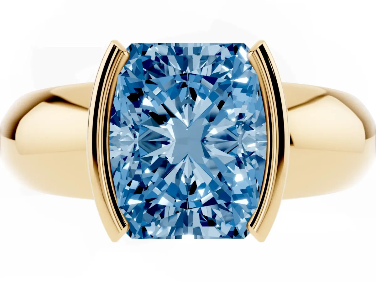 Fancy Blue Radiant Cut Solitaire Tension Set Diamond Ring with Wide Band Yellow gold