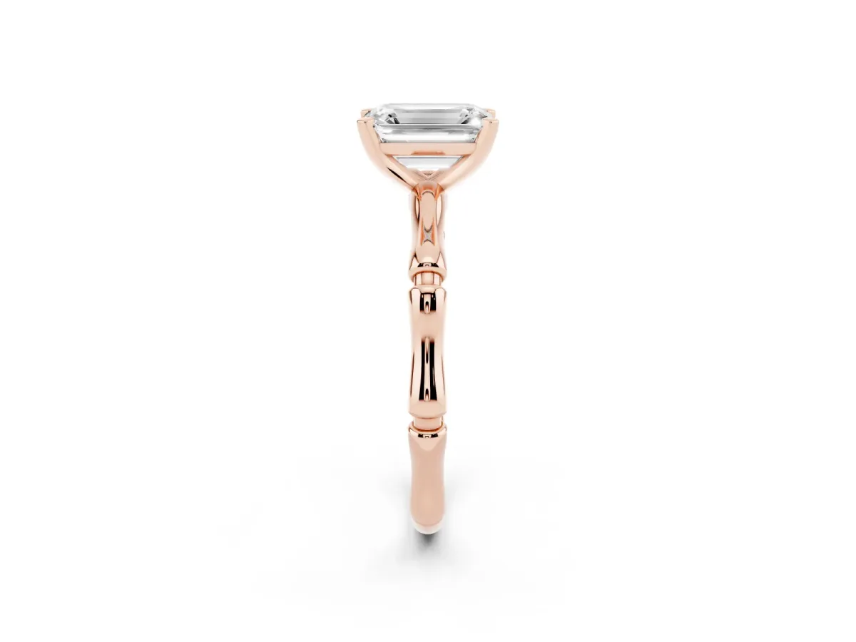 Emerald Cut Solitaire Diamond Ring with Bamboo Band and Four-Prong Setting Rose gold