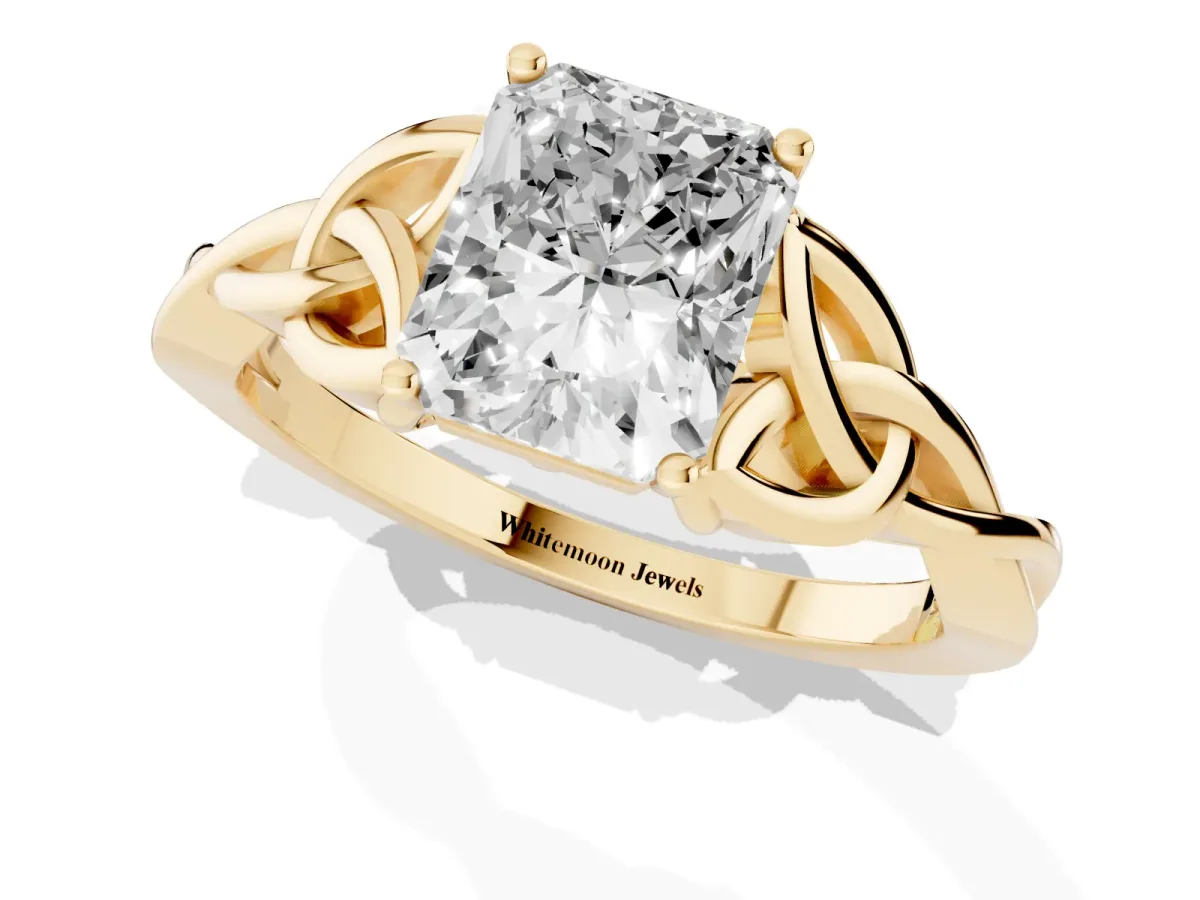 Radiant Cut Diamond Solitaire Engagement Ring with Celtic Knot Band and Four-Prong Setting Yellow gold
