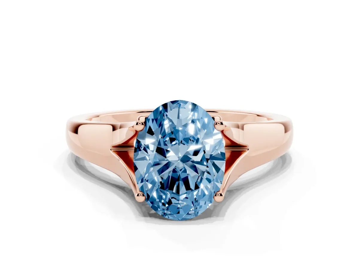 Fancy Blue Oval Cut Solitaire Diamond Ring with Cathedral Band and Four-Prong Setting Rose gold