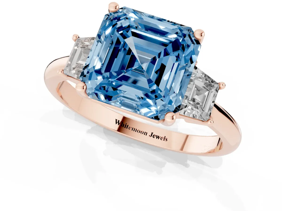 Fancy Blue Asscher Cut Diamond Three-Stone Ring with Trapezoid Side Stones and Prong Setting Rose gold