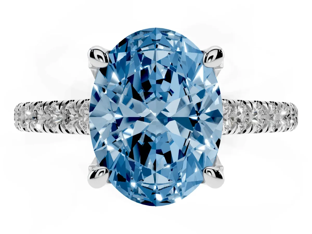 Fancy Blue Oval Cut Brilliant Diamond Solitaire with Pavé Band and Four-Prong Setting Platinum