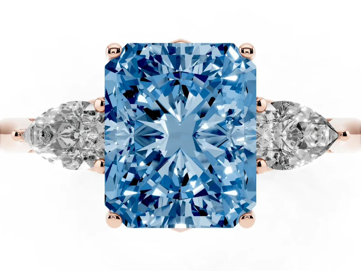 Fancy Blue Three-Stone Radiant Cut Brilliant Diamond Solitaire Ring with Tapered Band and Four-Prong Setting Rose gold