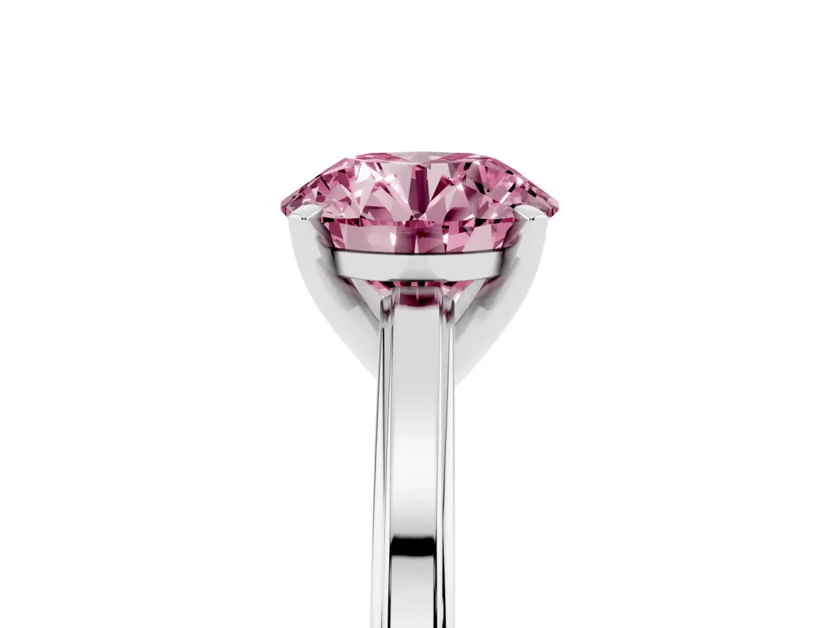 Fancy Pink Round Cut Solitaire Diamond Ring with Four-Prong Setting and Classic Band Platinum