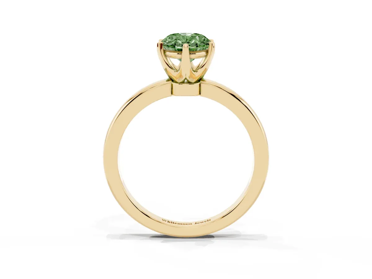 Fancy Green Oval Cut Solitaire Diamond Ring with Six-Prong Setting on a Classic Band Yellow gold