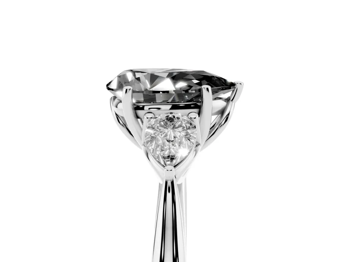 Fancy Black Three-Stone Pear Cut Brilliant Diamond Solitaire Ring with Tapered Band and Four-Prong Setting Platinum