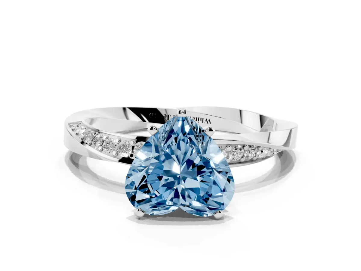 Fancy Blue Heart Cut Diamond Engagement Ring with Side Stone Accents and Four-Prong Setting Silver