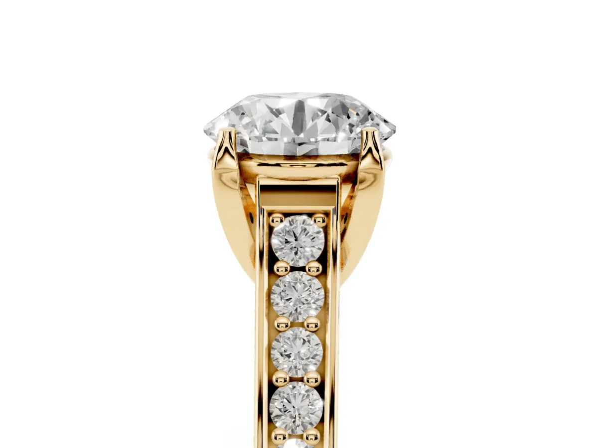 Round Cut Brilliant Cut Diamond Engagement Ring with Pavé Band and Four-Prong Setting Yellow gold