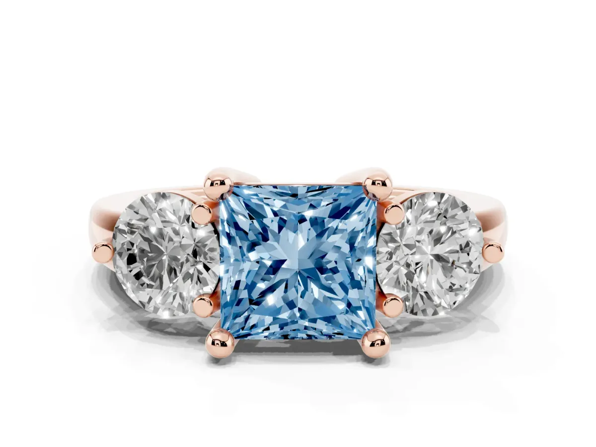 Fancy Blue Three-Stone Princess Cut Brilliant Cut Solitaire Ring with Prong Setting on a Classic Band Rose gold